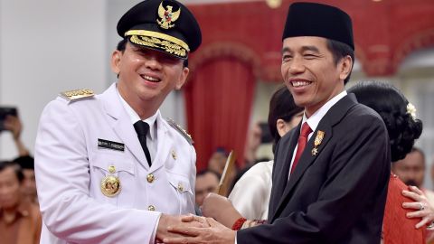Indonesian President Joko Widodo with Ahok after the latter's swearing in as governor on November 19, 2014. 
