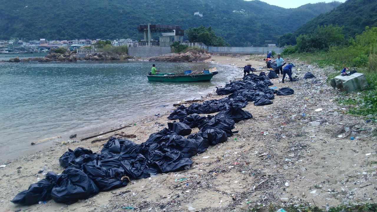 Trash is bagged on Sok Ku Wan beach.