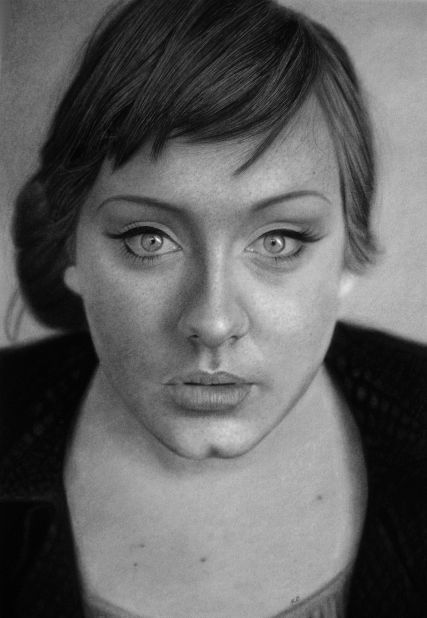 kafor's fascination for drawing with pencils began at eight years old. <br />Pictured here, an early drawing of Adele, before the artist refined his skills.<br />