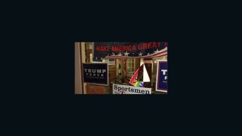 A window at Donald Trump's Denver campaign office shows damage Friday.