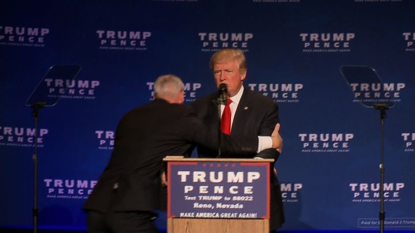01 Trump rushed off stage 1105