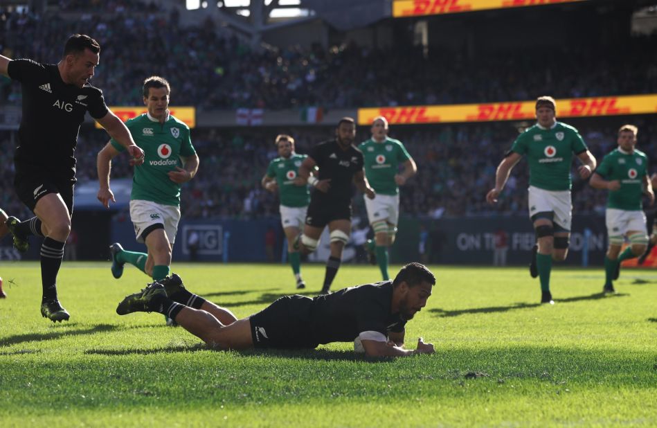 George Moala dives over to score the opening try for the All Blacks at Soldier Field.