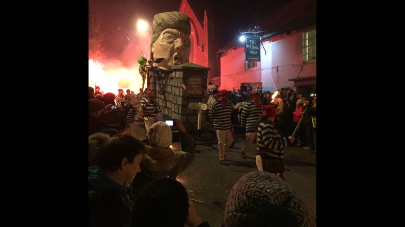 This effigy portrays the Republican presidential nominee as "Humpy Trumpty" sitting on his wall. Trump's proposal for a wall between Mexico and the United States has been a centerpiece of his campaign.