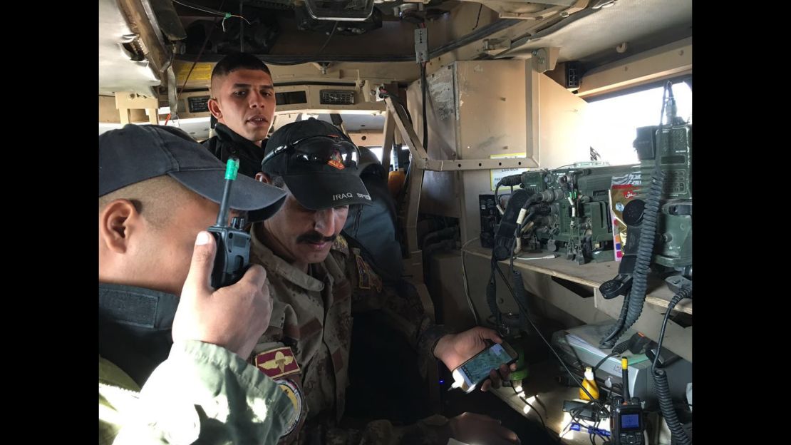 For more than 28 hours, CNN senior international correspondent Arwa Damon and photojournalist Brice Laine were with Iraqi special forces during their push into ISIS-held Mosul. Their convoy was leading the operation Friday when it came under attack multiple times. Here, on Friday at 9 a.m., soldiers make a frantic radio call: "Yellow car to the right."