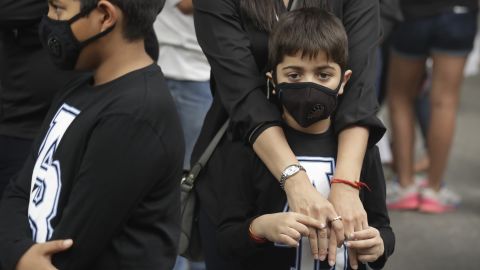 Children wear pollution masks at a protest against air pollution in New Delhi on Sunday.