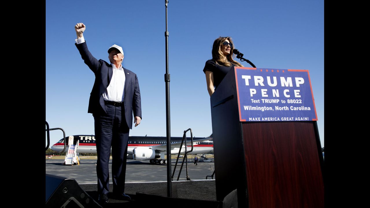 Trump and his wife, Melania, arrive at an airport rally in Wilmington, North Carolina, on November 5.