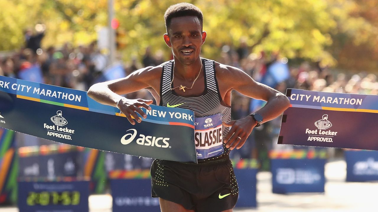 Ghirmay Ghebreslassie of Eritrea celebrates as he crosses the finish line.