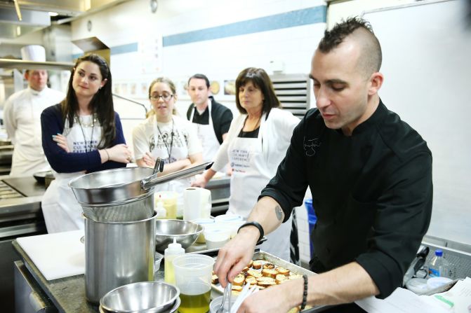 In 2010, Forgione won Season 3 of "The Next Iron Chef." Pictured here he teaches "Reinventing Classic Comfort Food" at the New York Culinary Experience in May 2013. 