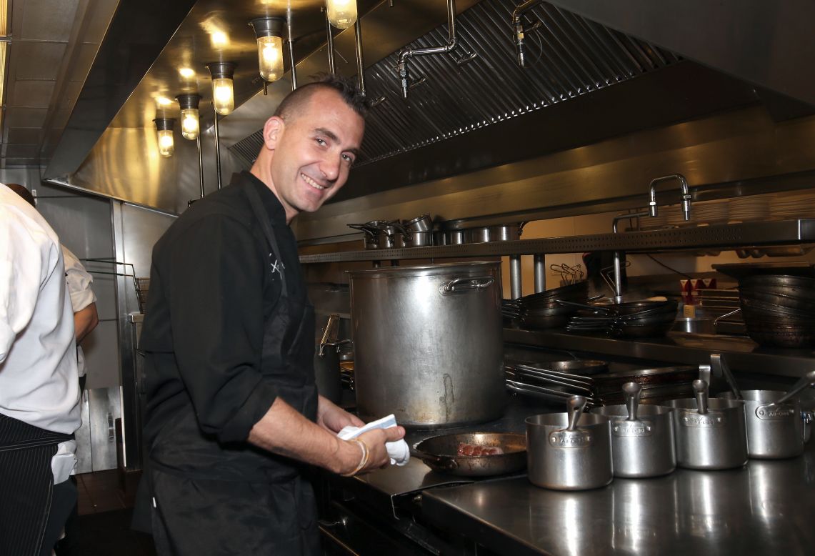 The acclaimed chef also spends time cooking for a good cause. Pictured here he prepares a meal for celebrity chef  Andrew Zimmern's "Dinner For A Better New York" benefiting "Services For The UnderServed," which offers housing and skills building for disadvantaged people.