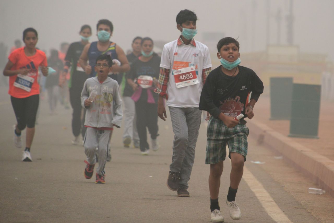 Young Indian runners take part in the New Delhi 10K Challenge amid heavy smog on November 6.