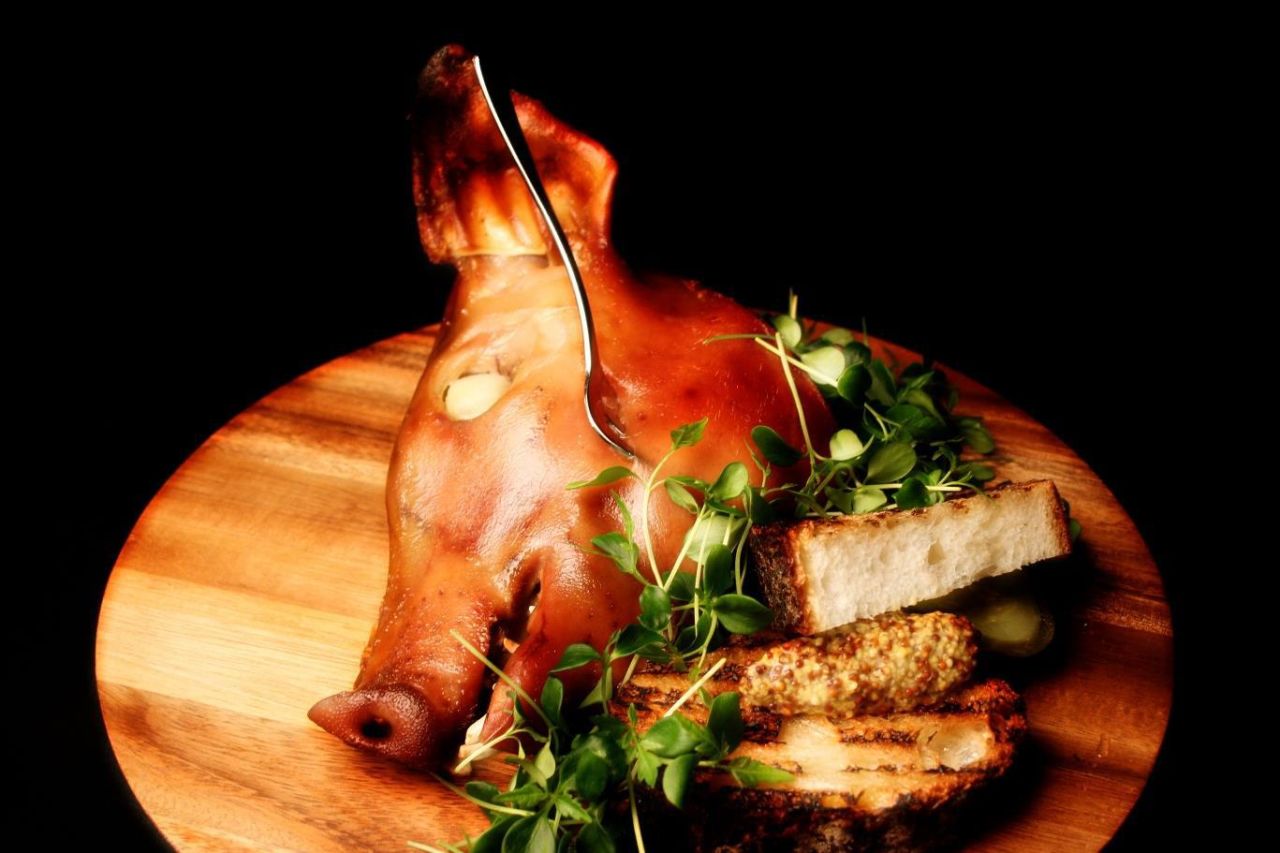 Marc Forgione's suckling pig face.