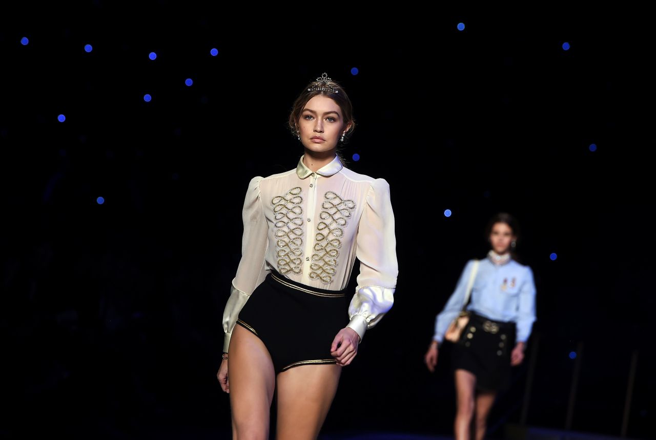 Gigi Hadid wear a military-inspired look at Tommy Hilfiger's Autumn-Winter 2016 show.