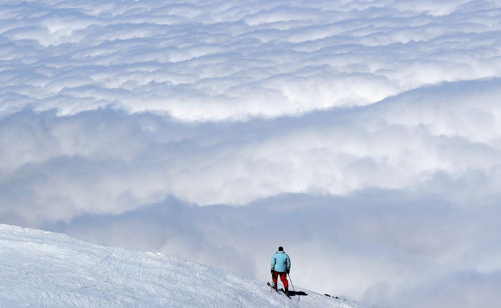 Low lying clouds obscure views of the Sahara for a skier in Oukaimeden. Topping out at 10,603 feet, the resort's skiable terrain is even higher than Val Thorens in France, one of Europe's most snow-sure destinations.