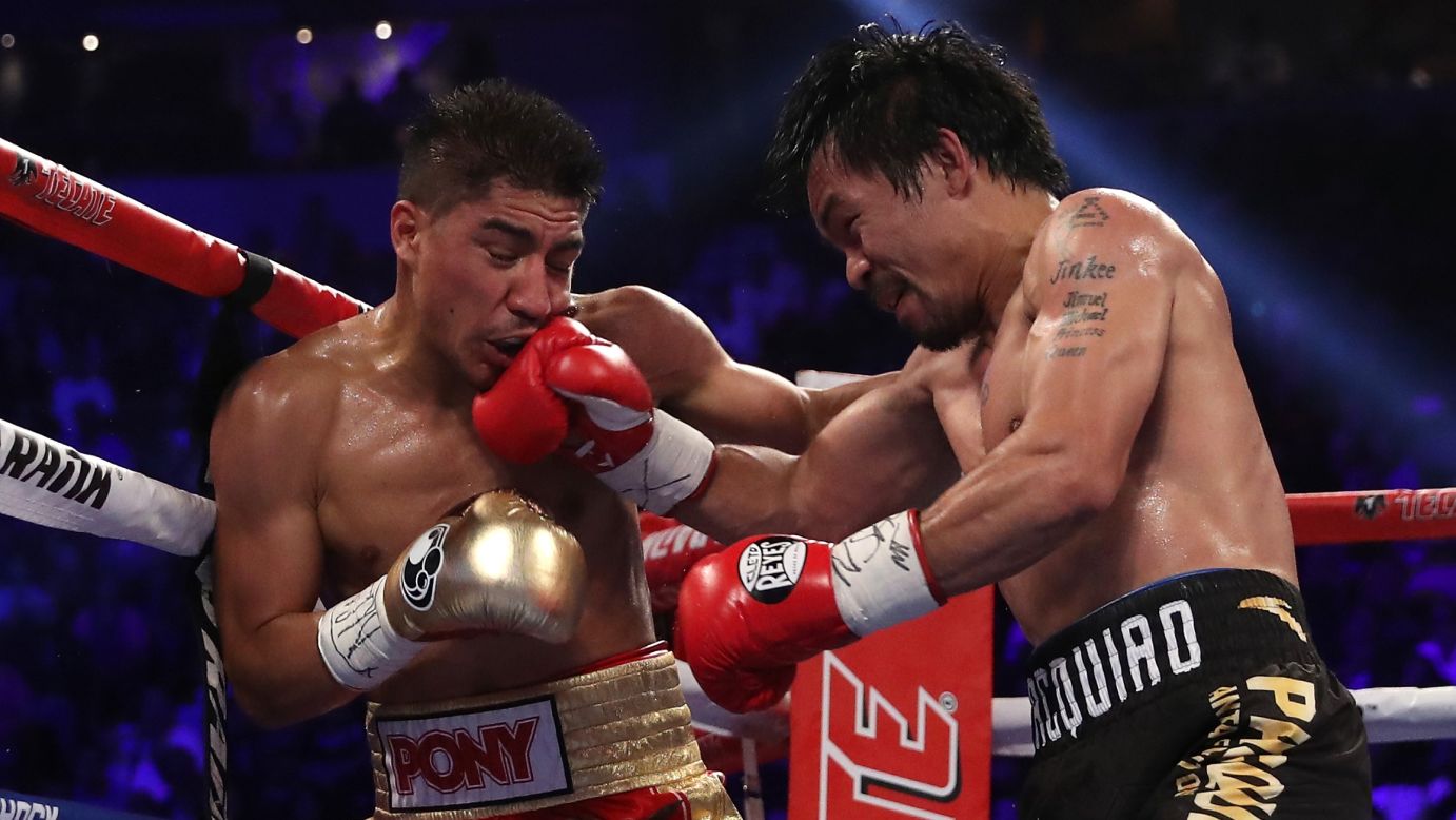 Manny Pacquiao punches Jessie Vargas during their welterweight title fight on Saturday, November 5. Pacquiao won by unanimous decision.