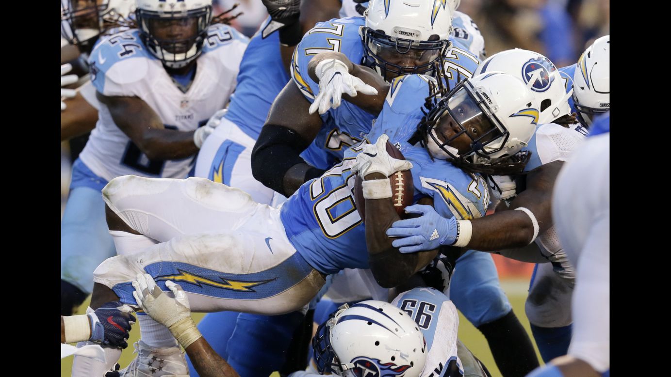 San Diego running back Melvin Gordon is tackled by Tennessee Titans during an NFL game in San Diego on Sunday, November 6. Gordon rushed for 196 yards and a touchdown as the Chargers won 43-35.