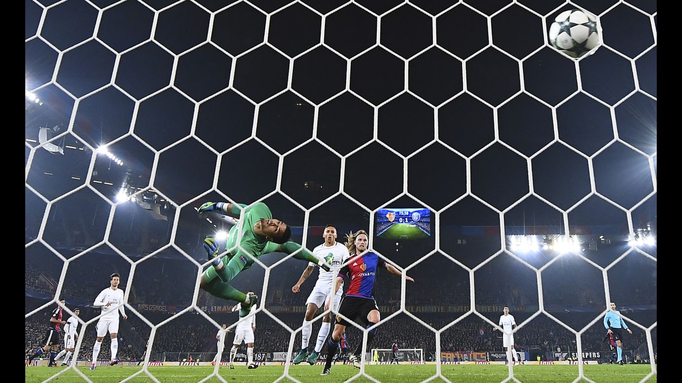 Alphonse Areola, goalkeeper for Paris Saint-Germain, watches the ball go into his net during a Champions League match in Basel, Switzerland, on Tuesday, November 1. PSG defeated Basel 2-1.