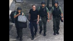 British ex-banker Rurik Jutting walks through a courtyard at the Lai Chi Kok Reception Centre shortly before boarding a high security prison van which will bring him to his trial at the High Court of Hong Kong for the alleged killing of two Indonesian women in October 2014, Hong Kong, China, 01 November 2016.