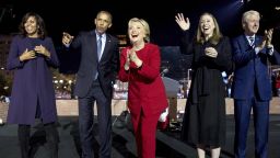 Democratic presidential candidate Hillary Clinton, center, is joined on stage by first lady Michelle Obama, left, President Barack Obama, second from left, Chelsea Clinton, second from right, and former President Bill Clinton, right, after speaking at a rally at Independence Mall in Philadelphia, Monday, Nov. 7, 2016. (AP Photo/Andrew Harnik)