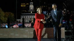 Democratic party nominee Hillary Clinton walks on stage with US President Barack Obama during a rally for Democratic presidential nominee Hillary Clinton, on Independence Mall, November 7, 2016 in Philadelphia, Pennsylvania.