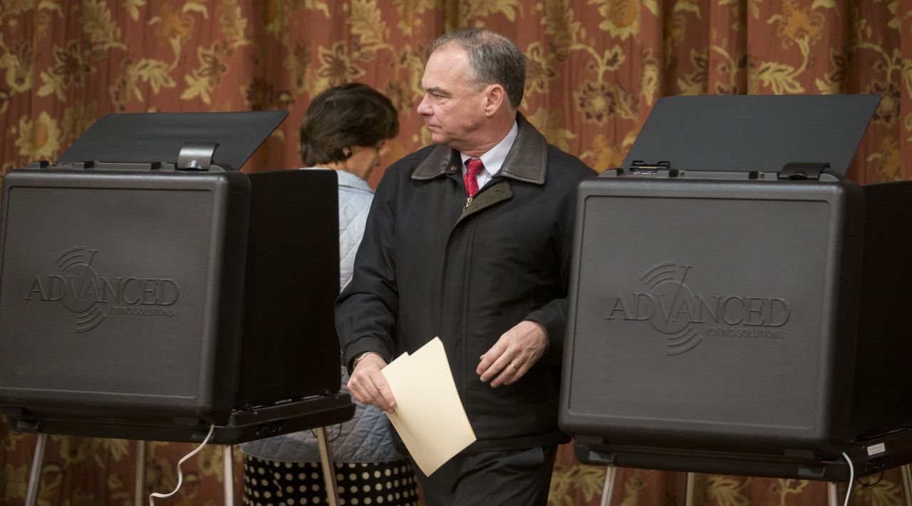 Clinton's running mate, U.S. Sen. Tim Kaine, votes with his wife, Anne Holton, in Richmond, Virginia.