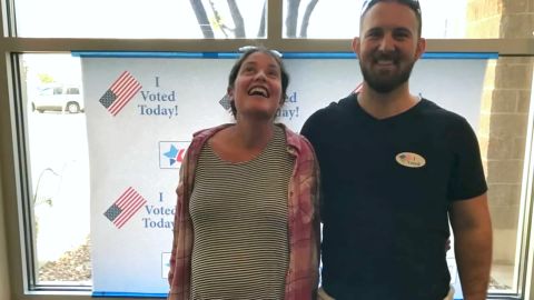 Adelstein and partner Max Brandel make a last-minute stop to vote.