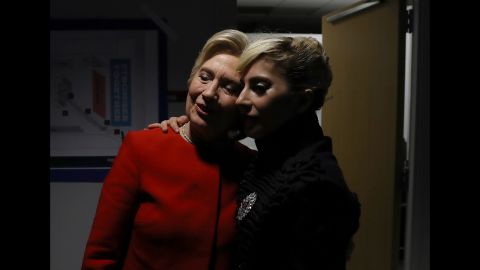 Clinton greets Lady Gaga backstage after the campaign event in Raleigh on November 8. The singer urged the crowd to make history and elect the first woman president. 