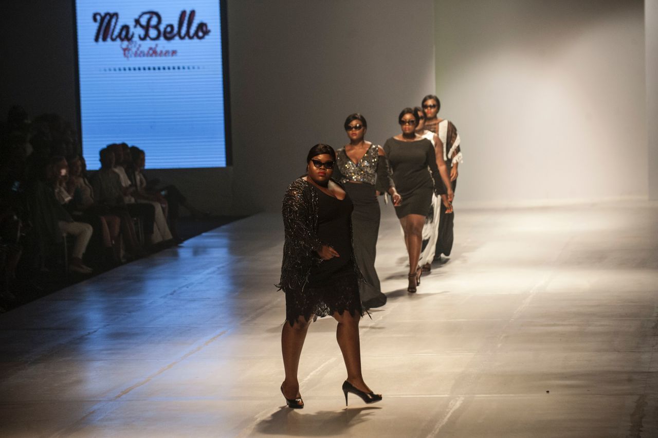 The fashion and lifestyle journalist lobbied her heart out to feature a plus-size collective at Africa's biggest fashion event of the year.<br />Pictured: Models at LFDW display clothes by designer Osa Aisien from MaBello Clothier, the first solely Nigerian brand catering for women with curves. <br />Photo: Stefan Heunis/AFP/Getty Images