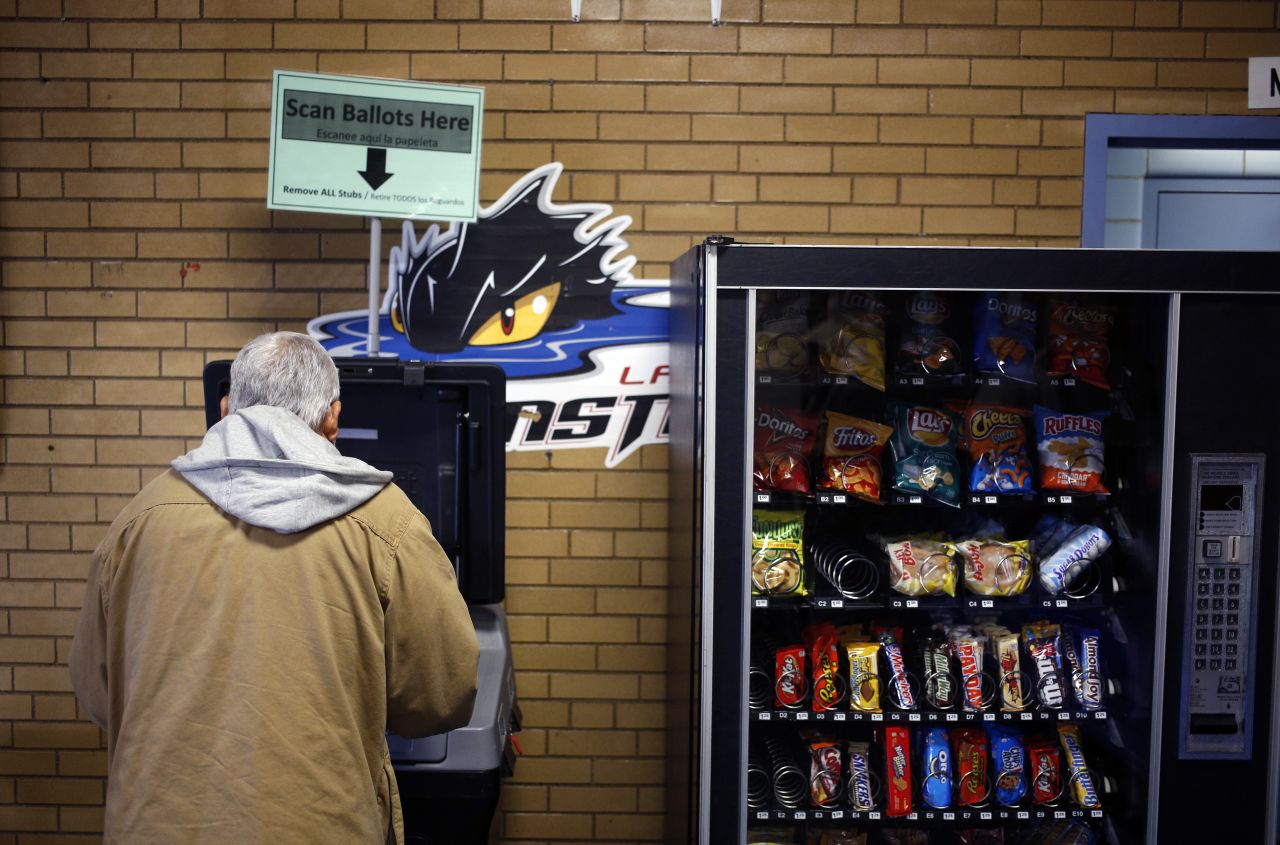 A voter casts a ballot inside the Halloran Skating Rink in Cleveland.