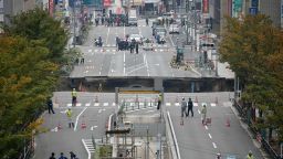This photo shows a giant sinkhole (C) in a five-lane urban boulevard, eroding soil and exposing underground steel columns supporting commercial buildings in Fukuoka, southwestern Japan, on November 8, 2016. 
No injuries were reported as the accident occurred in the early morning hours.      / AFP / JIJI PRESS / STR / Japan OUT        (Photo credit should read STR/AFP/Getty Images)