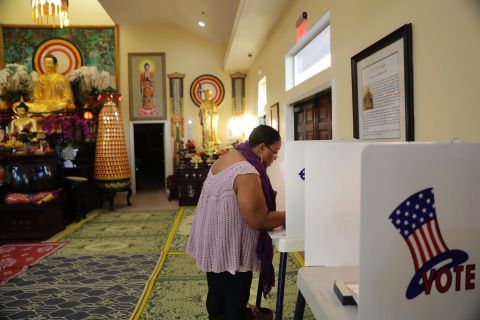 Denise Richardson votes at the Chua Phat To Gotama Temple in Long Beach, California.