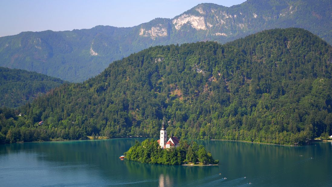 The Romanesque tower and church on the rock in the middle of the emerald-green Lake Bled is a real showstopper. 
