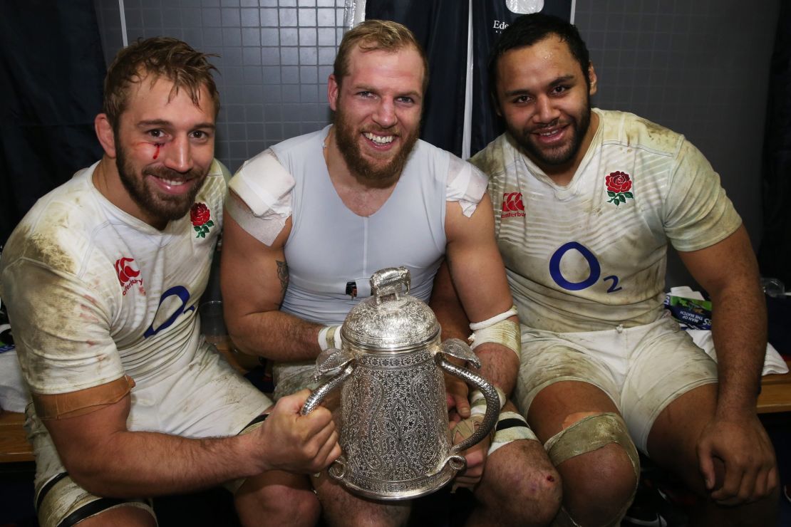 Chris Robshaw, James Haskell and Billy Vunipola of England pose with the Calcutta Cup in 2016.