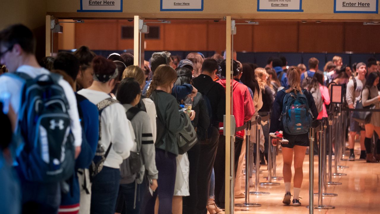Penn State students stand in line inside the Student Union, called The Hub, waiting to cast their ballots in State College, Pennsylvania. 