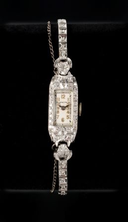 The auction will continue until Nov. 19. Remaining items include this diamond Art Deco watch.