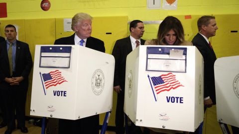 Republican presidential nominee Donald Trump looks at his wife, Melania, as they cast their votes in New York.