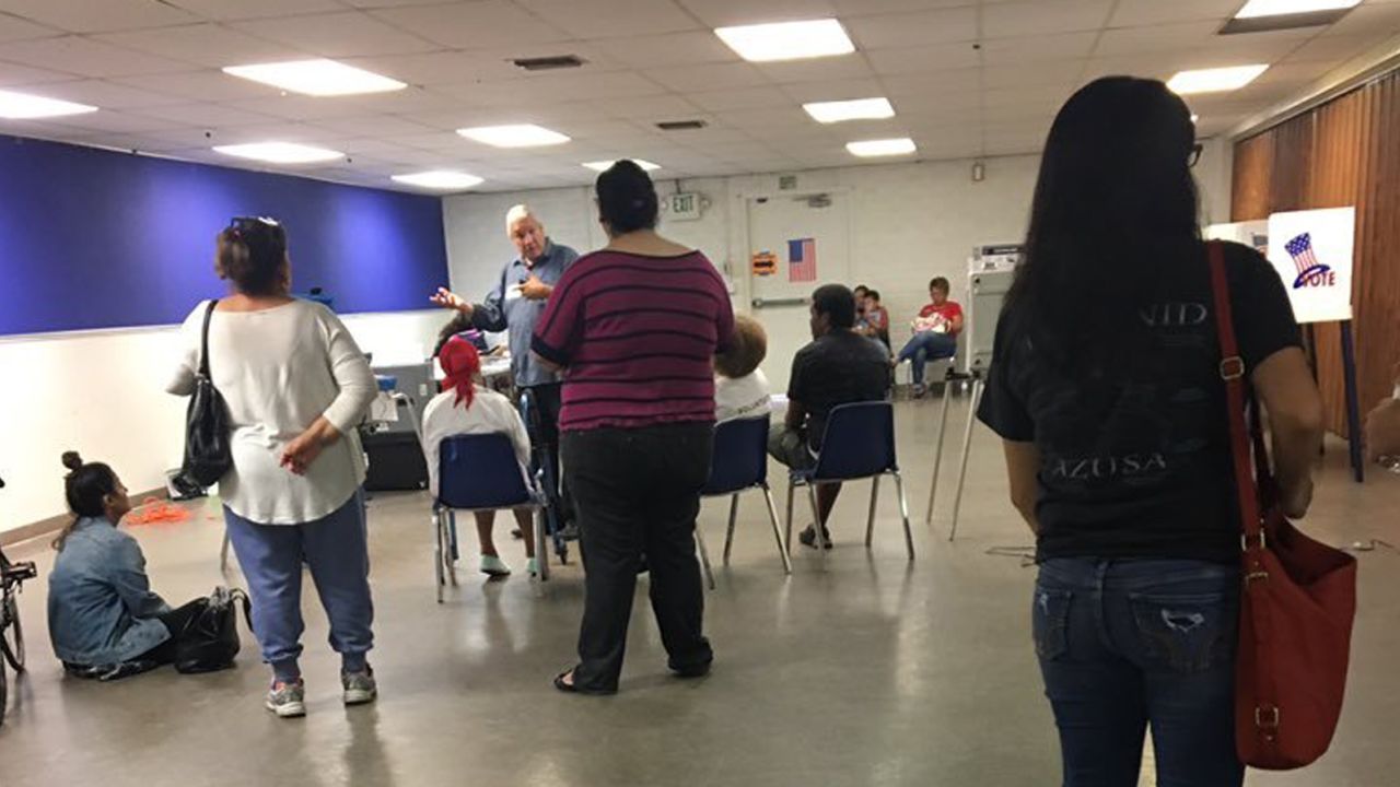 The scene inside a polling place Tuesday afternoon in Azusa, where voters said they heard gunshots.