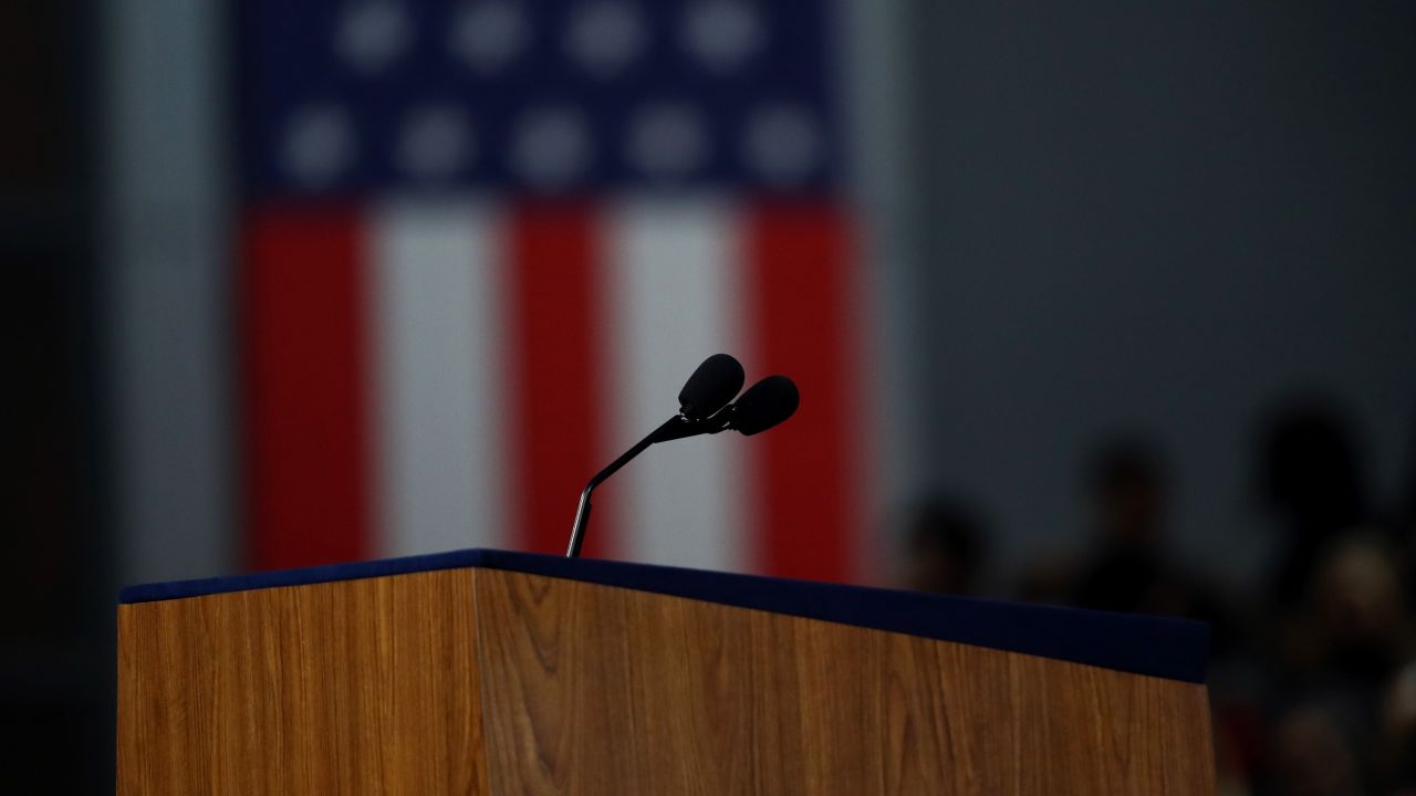 An empty lectern is seen at the Javits Center -- the site of Clinton's election night gathering in New York -- on November 9, 2016. With Clinton trailing in the Electoral College and a few remaining states too close to call, Clinton's campaign chief, John Podesta, announced that Clinton would not be giving a speech to the crowd. She later called Trump to concede the election.