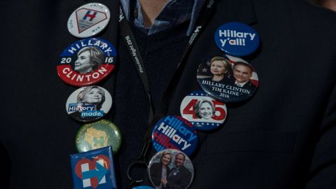 Buttons decorate a Clinton supporter at the Javits Center.