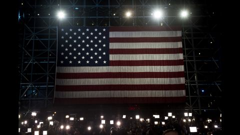 An American flag hangs above the media at the Javits Center.