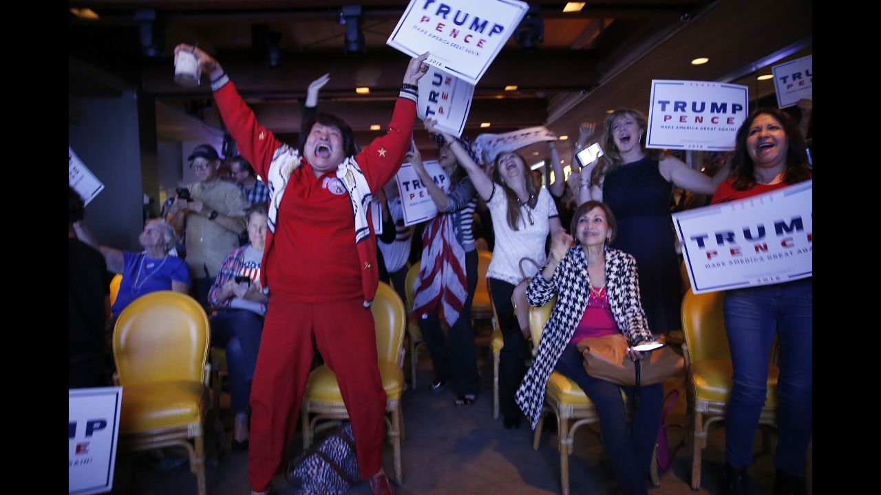 Republicans in Newport Beach, California, erupt in celebration as Trump's victory in Florida is announced.