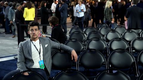 A person sits at the Javits Center, the site of Clinton's election night event in New York.