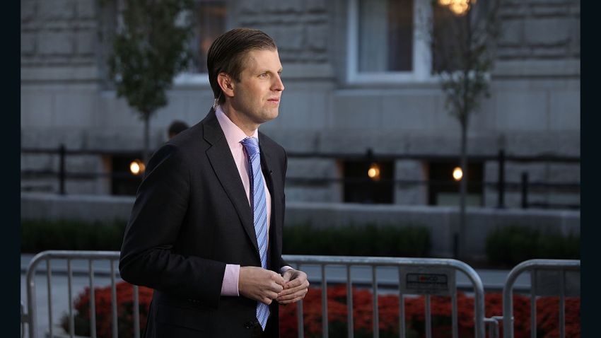 WASHINGTON, DC - OCTOBER 26:  Eric Trump, son of Republican presidential nominee Donald Trump, does a television interview before the ribbon cutting ceremony during the grand opening of the new Trump International Hotel October 26, 2016 in Washington, DC. The hotel, built inside the historic Old Post Office, has 263 luxry rooms, including the 6,300-square-foot 'Trump Townhouse' at $100,000 a night, with a five-night minimum. The Trump Organization was granted a 60-year lease to the historic building by the federal government before the billionaire New York real estate mogul announced his intent to run for president.  (Photo by Chip Somodevilla/Getty Images)
