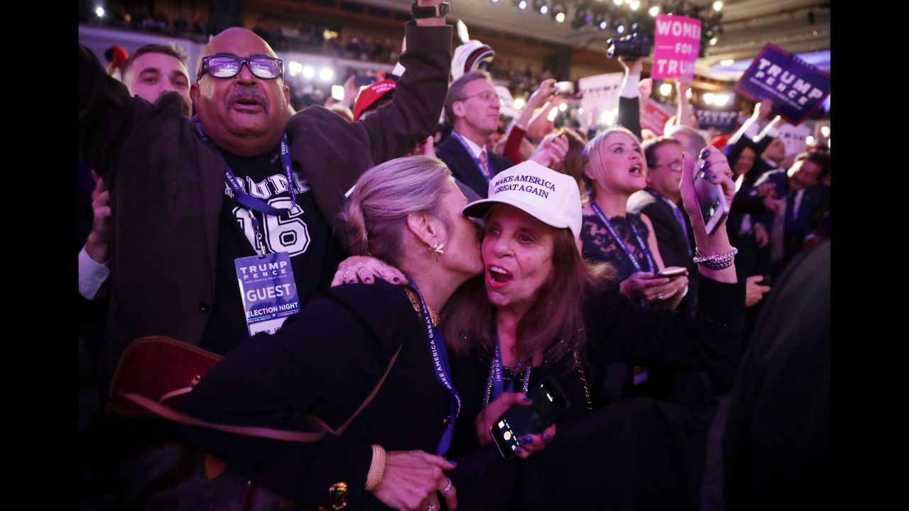 People celebrate Trump's win during a victory party at the New York Hilton Midtown Hotel.