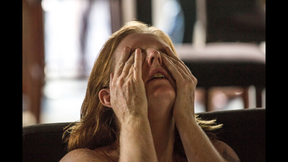 A Democratic supporter cries after Trump's victory is announced