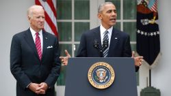 President Barack Obama, accompanied by Vice President Joe Biden, speaks in the election, Wednesday, Nov. 9, 2016, in the Rose Garden of the White House in Washington.