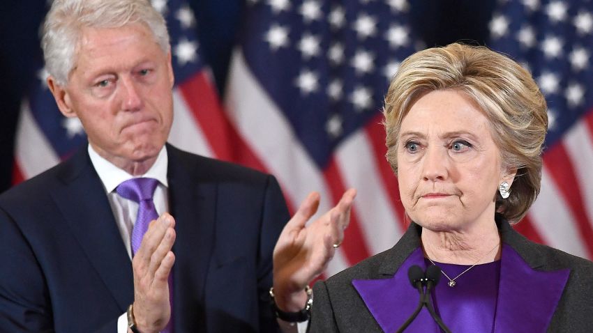 US Democratic presidential candidate Hillary Clinton makes a concession speech after being defeated by Republican President-elect Donald Trump, as former President Bill Clinton looks on in New York on November 9, 2016. / AFP / JEWEL SAMAD        (Photo credit should read JEWEL SAMAD/AFP/Getty Images)