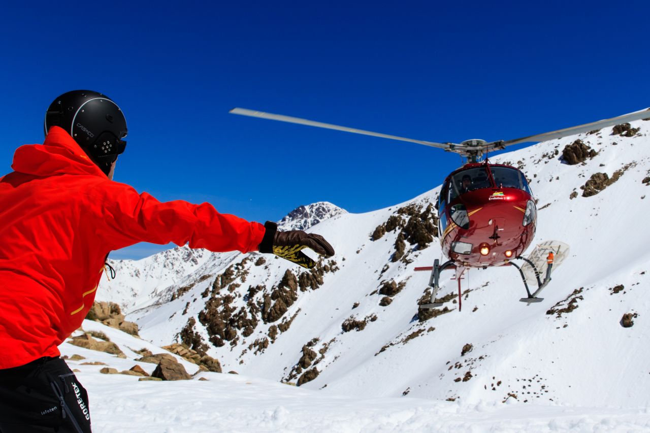 A helicopter, guided by a French pilot, takes skiers from the balmy valley floor to the snow in a mere 25 minutes.