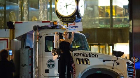 Lady Gaga protests against Donald Trump early Wednesday outside Trump Tower in New York.