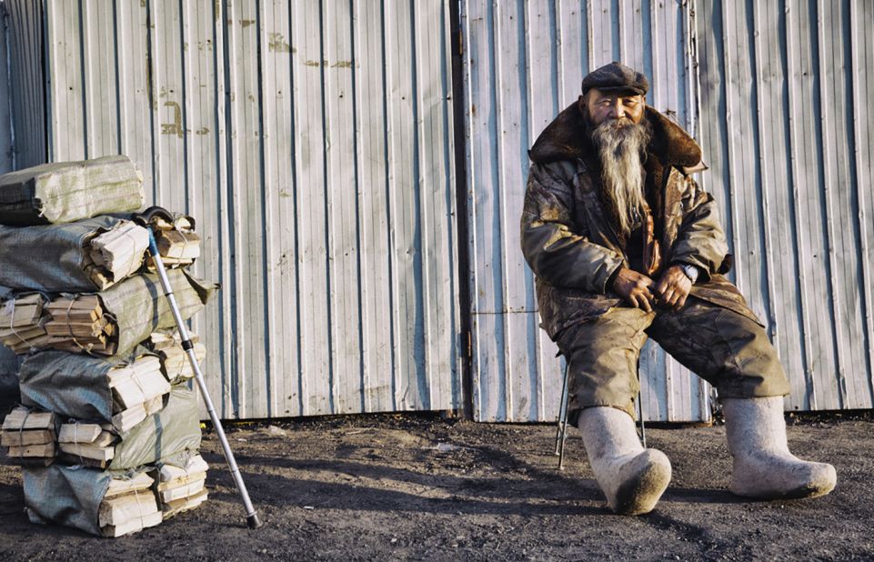 Since 2014, Photographer Paul Cox has been dedicated to capturing portraits of life in Mongolia's poor city districts. Scroll through the gallery and read his thoughts on his work: <br /><br />"It's winter, -15 degrees Celsius, and his pure woolen boots were there to keep him warm. He was selling wood. The winter of Ulaanbaatar is very polluted with all the coal and wood burning." 