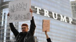 People take part in a protest near the Trump tower, against President-elect Donald Trump, in Chicago, Illinois on November 9, 2016. / AFP / Paul Beaty        (Photo credit should read PAUL BEATY/AFP/Getty Images)